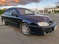 2006 Kia Spectra I Рестайлинг 2, чёрный, 160000 рублей - вид 1