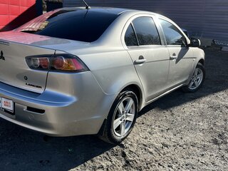 2011 Mitsubishi Lancer X Рестайлинг, серебристый, 850000 рублей, вид 2
