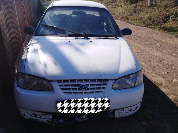 1998 Kia Avella, белый - вид 1