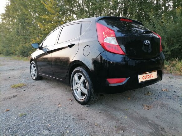 2013 Hyundai Solaris I, чёрный, 900000 рублей - вид 6