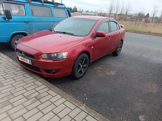 2007 Mitsubishi Lancer X, красный, 630000 рублей, вид 1