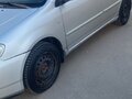 2006 Toyota Corolla IX (E120, E130) Рестайлинг, серебристый, 525000 рублей - вид 2