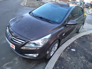 2014 Hyundai Solaris I Рестайлинг, коричневый, 850000 рублей, вид 3