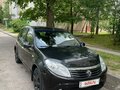 2011 Renault Sandero I, чёрный, 565620 рублей