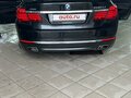 2012 BMW 7 серии 750Li xDrive V (F01/F02/F04) Рестайлинг, чёрный - вид 5