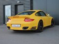2009 Porsche 911 Turbo VI (997) Рестайлинг, жёлтый - вид 4