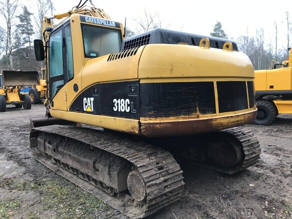 2006 Caterpillar 318, жёлтый - вид 2
