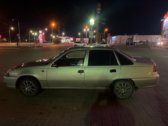 2010 Daewoo Nexia I Рестайлинг, серебристый, 300000 рублей - вид 6