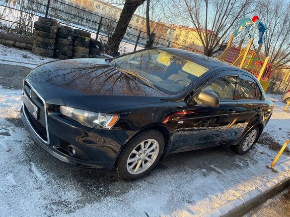2014 Mitsubishi Lancer X Рестайлинг, чёрный, 980000 рублей - вид 8
