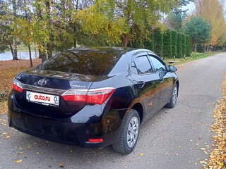 2014 Toyota Corolla XI (E160, E170, E180), чёрный, 969000 рублей, вид 3