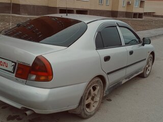 1998 Mitsubishi Carisma I, серебристый, 900000 рублей, вид 3