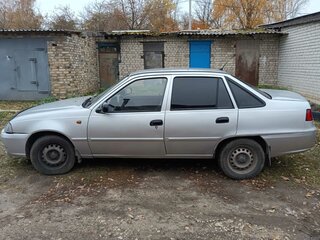 2012 Daewoo Nexia I Рестайлинг, серебристый, 230000 рублей, вид 2