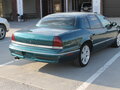 1996 Chrysler LHS I, зелёный - вид 3