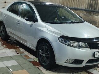 2010 Kia Cerato 6-speed II, серебристый, 880000 рублей, вид 2