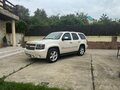 2012 Chevrolet Tahoe 6AT III, белый, 2680000 рублей - вид 1