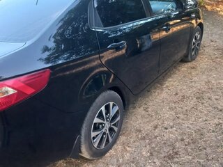 2012 Kia Rio 5-speed III, чёрный, 820000 рублей, вид 4