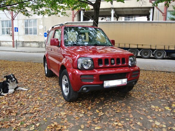 2011 Suzuki Jimny III Рестайлинг 1, красный - вид 9