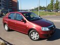 2012 Renault Logan I Рестайлинг, красный - вид 2