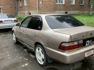 1993 Toyota Corolla VII (E100), коричневый, 189099 рублей, вид 4