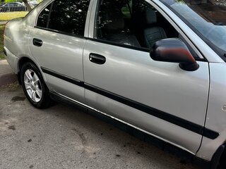 2003 Mitsubishi Carisma I Рестайлинг, серебристый, 350000 рублей, вид 3