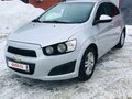 2012 Chevrolet Aveo II, серебристый, 680000 рублей - вид 1