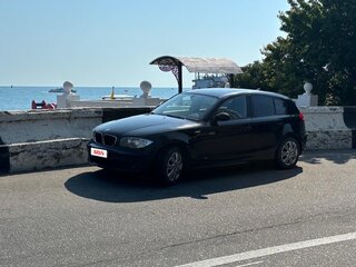 2009 BMW 1 серии 116i I (E81/E82/E87/E88) Рестайлинг, чёрный, 750000 рублей, вид 1