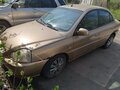2004 Kia Rio I Рестайлинг, бежевый - вид 1