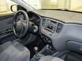 2010 Kia Rio II Рестайлинг, бежевый - вид 6