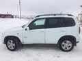 2010 Chevrolet Niva I Рестайлинг, белый, 530000 рублей - вид 3