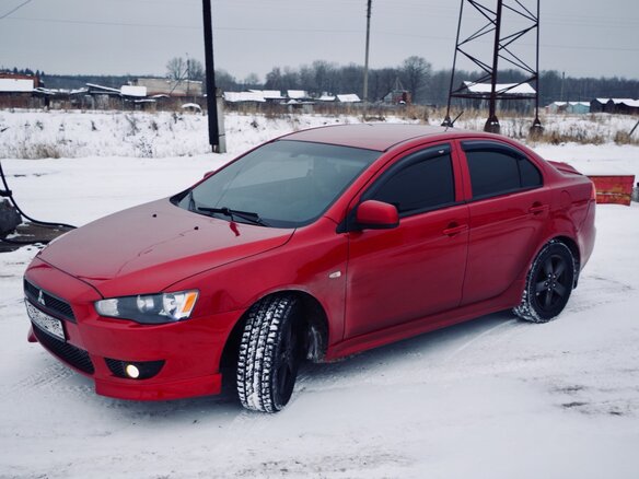 2007 Mitsubishi Lancer X, красный - вид 2