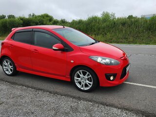 2009 Mazda Demio III (DE), красный, 650000 рублей, вид 2