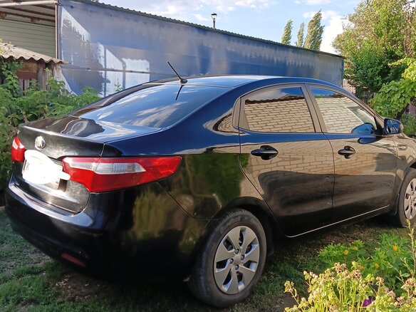 2013 Kia Rio 5-speed III, чёрный, 800000 рублей - вид 8