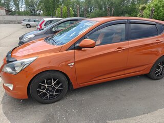 2015 Hyundai Solaris I Рестайлинг, оранжевый, 975000 рублей, вид 4