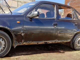 2012 Daewoo Nexia I Рестайлинг, чёрный, 166000 рублей, вид 3