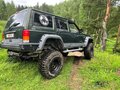 1997 Jeep Cherokee II (XJ) Рестайлинг, зелёный - вид 7