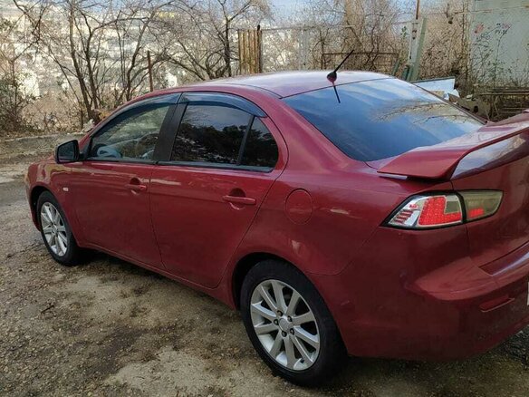 2007 Mitsubishi Lancer X, красный, 650000 рублей - вид 5
