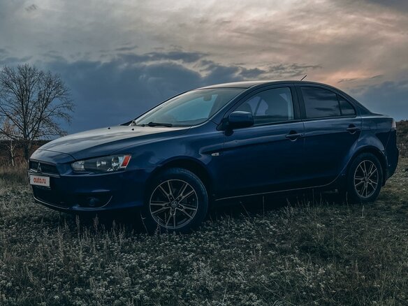 2010 Mitsubishi Lancer X, синий, 900000 рублей - вид 1