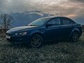 2010 Mitsubishi Lancer X, синий, 900000 рублей - вид 1