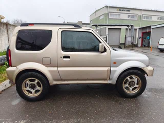 2007 Suzuki Jimny III Рестайлинг 1, серебристый, 550000 рублей, вид 2