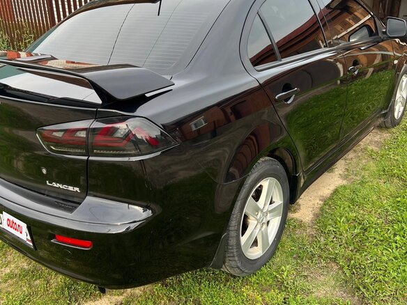 2008 Mitsubishi Lancer X, чёрный, 700000 рублей - вид 8