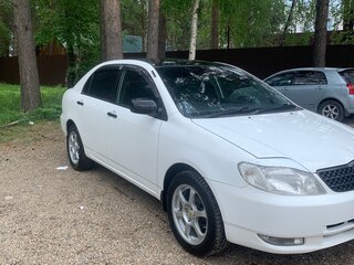 2003 Toyota Corolla IX (E120, E130), белый, 610000 рублей, вид 3