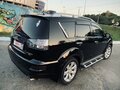 2009 Mitsubishi Outlander II Рестайлинг, чёрный, 1550000 рублей - вид 3
