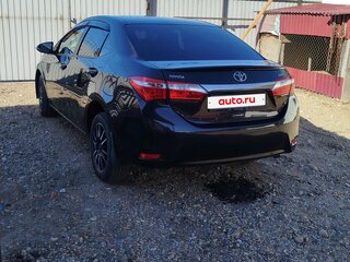 2014 Toyota Corolla XI (E160, E170, E180), чёрный, 1450000 рублей, вид 3