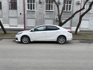 2016 Toyota Corolla XI (E160, E170, E180) Рестайлинг 1, белый, 1450000 рублей, вид 3