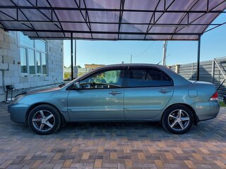 2009 Mitsubishi Lancer Classic IX Рестайлинг, голубой, 800000 рублей, вид 2