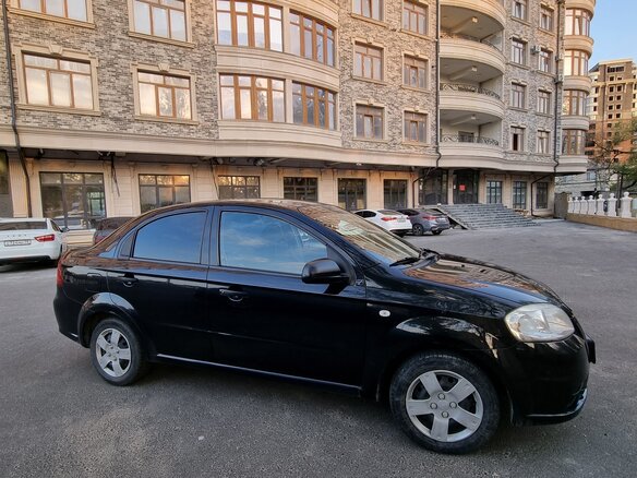 2010 Chevrolet Aveo I Рестайлинг, чёрный, 600000 рублей - вид 2