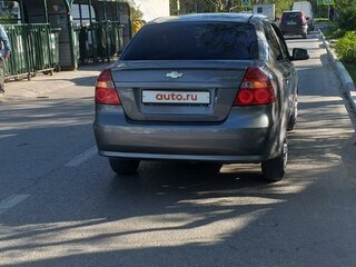 2011 Chevrolet Aveo I Рестайлинг, серебристый, 540000 рублей, вид 2