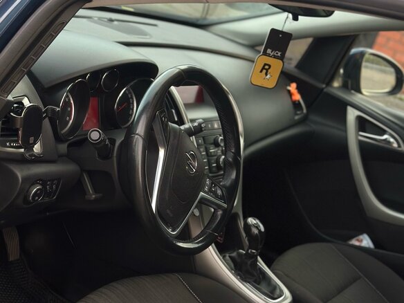 2010 Opel Astra J, синий - вид 4