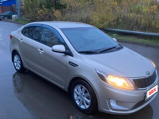 2015 Kia Rio 6-speed III, бежевый, 1100000 рублей, вид 1