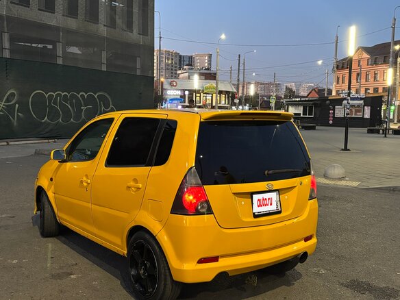 2002 Daihatsu YRV I Рестайлинг, жёлтый, 400000 рублей - вид 3